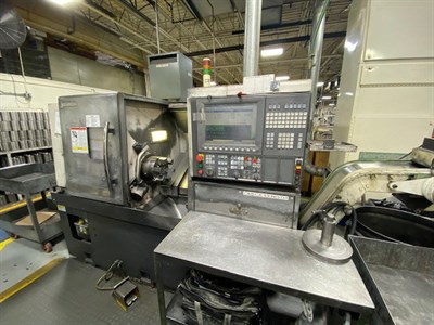 OKUMA GENOS L400 CNC UNIVERSAL TURNING CENTER